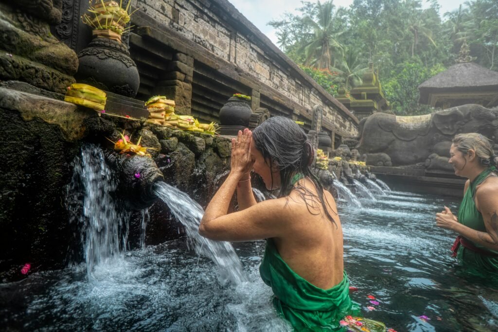 pexels photo 2166608 2166608 Women participating in a sacred water purification ritual at Pura Tirta Empul Temple in Bali, Indonesia.